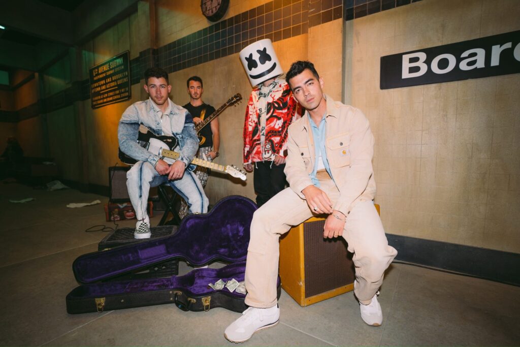 The Jonas Brothers And Marshmello Team up For "Leave Before You Love Me"