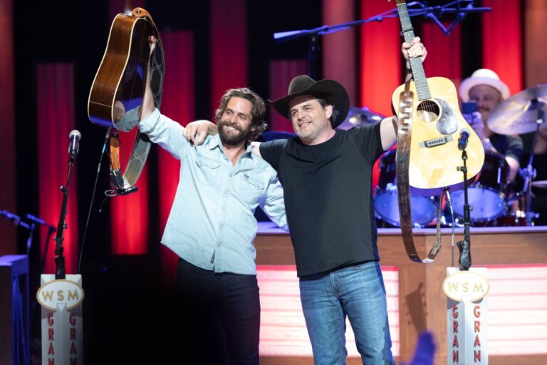 Thomas Rhett and his father, Rhett Akins, performed "Things Dads Do" at the Grand Ole Opry theater in Nashville, TN.