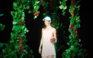 Polachek from the "Billions" music video