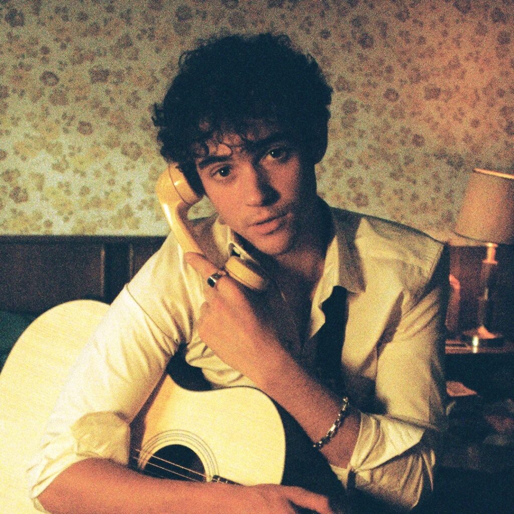 Joshua Bassett sad songs in a hotel room