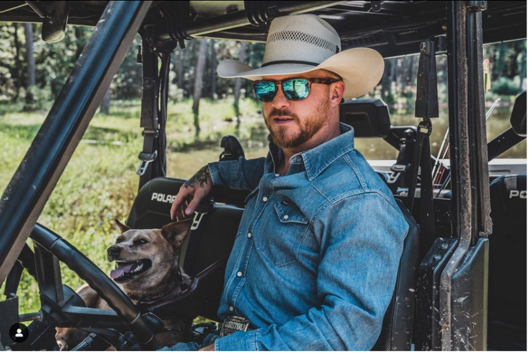 Cody Johnson with dog in car, advertising polarized sunglasses