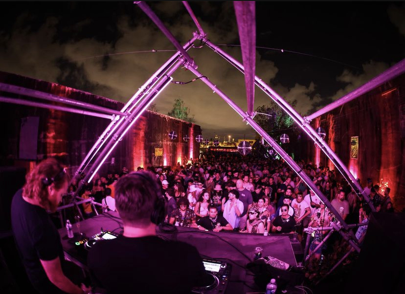 On October 20 and 21, Miami’s III Points Festival 2023 takes over Mana Wynwood Convention Center to celebrate 10 years of arts & music. This year, III Points ups their iconic electronic roster to house show-stopping hip-hop talent. Headliners of this year’s III Points Festival include Fred Again.., Skrillex, Iggy Pop, Grimes, and Black Coffee.