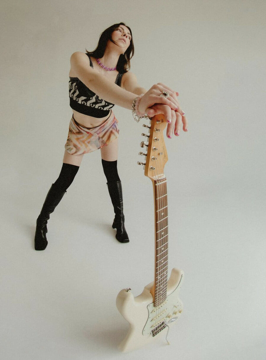 Anna Shoemaker with strat guitar