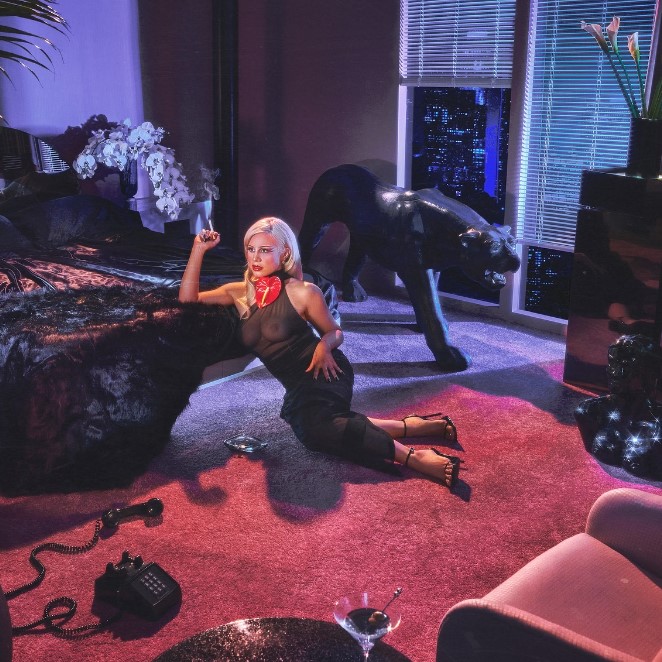 The cover art for Slayyyter's 'Starf*cker (Deluxe),' an additional three track offering added onto the original project's tracklist.