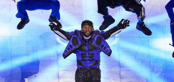 Usher, pictured amid the "roller derby" halftime performance at Super Bowl LVIII.