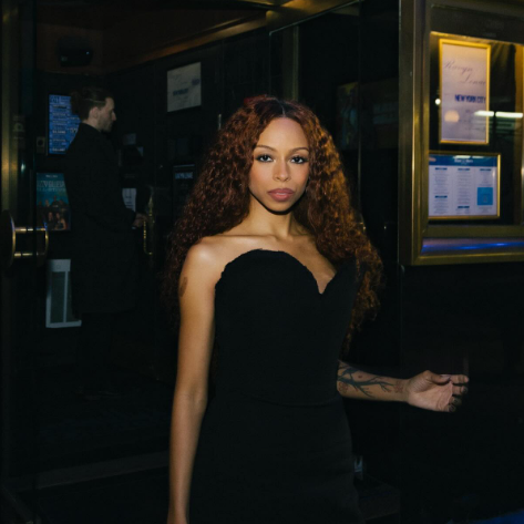 A still of Chicago singer Ravyn Lenae, featured on our Tracks ranking alongside PLUTO.